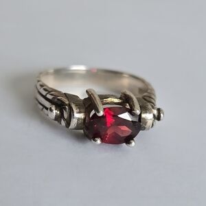 925 Sterling Silver ring with a solitary Garnet Stone